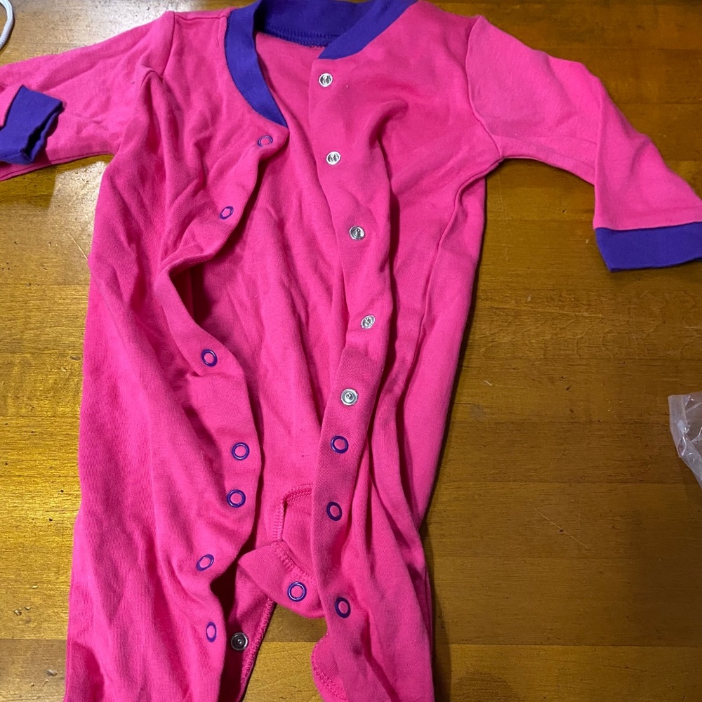 Pink long sleeved onesie